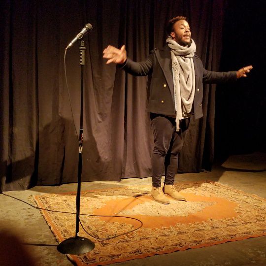 Devon Ginn reciting a poem